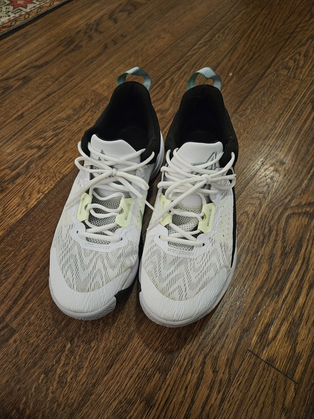 Nike Men's White Black Athletic Shoes with Light Green Accents